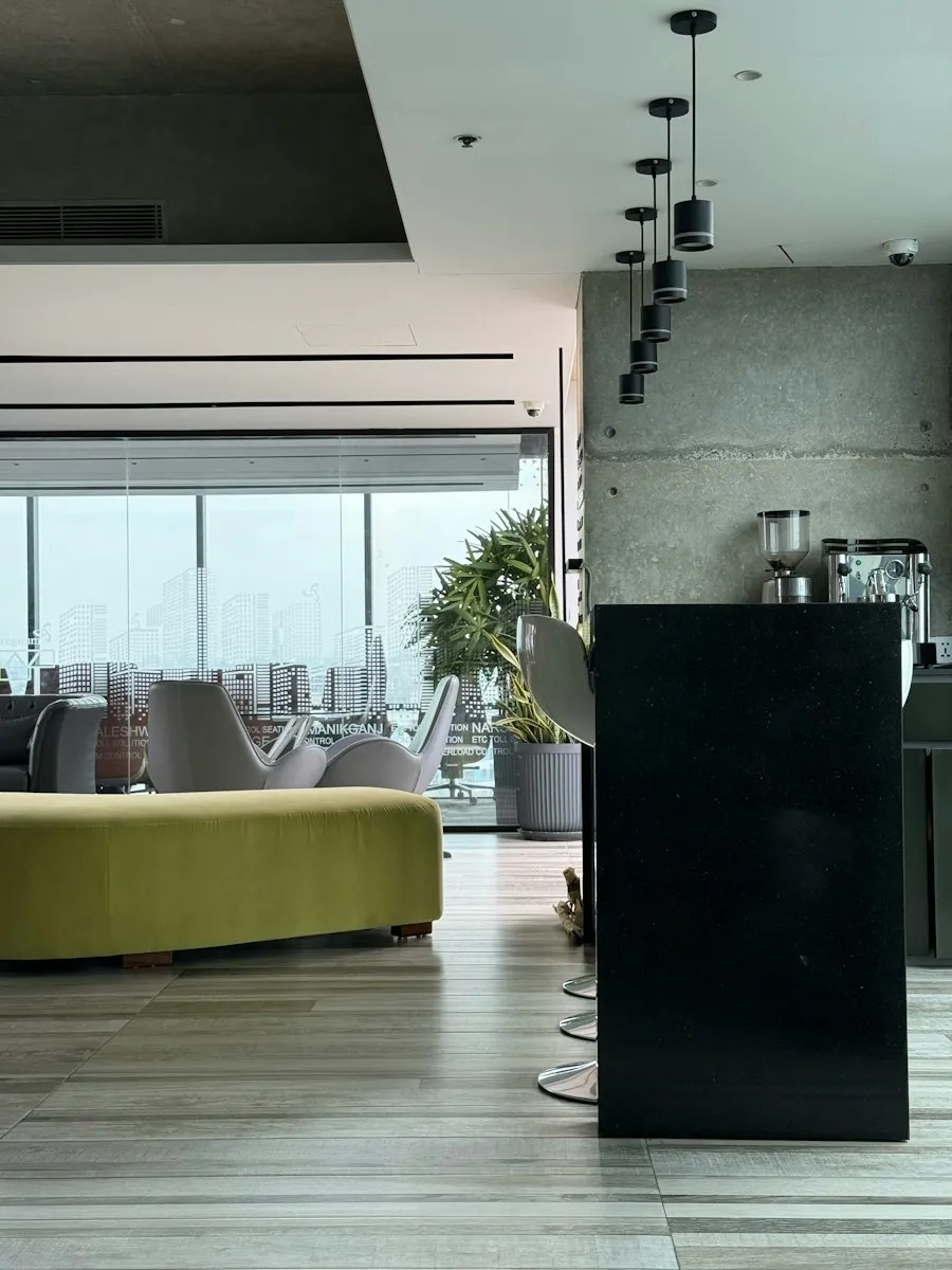 Modern office lounge with a yellow bench
